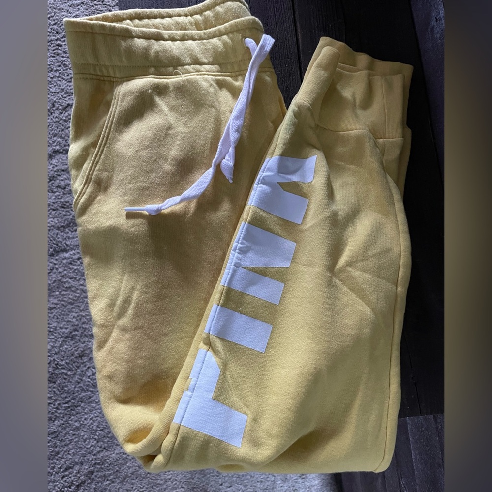 Women’s VS pink joggers (small red color on leg) bled in the wash.